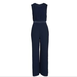 Satin Detail Crepe Jumpsuit
VINCE CAMUTO size 8
